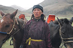 This horsewoman supplements her meagre income by offering hour-long rides to foreign tourists.