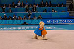 The Olympic Mascots, Phevos and Athena, play up for the foreign media.