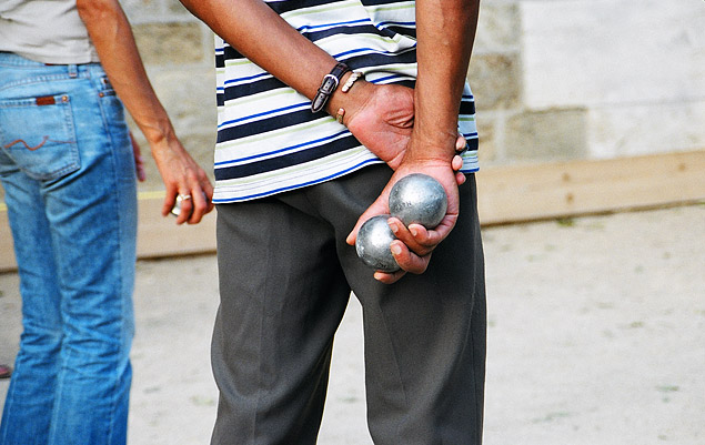 The traditional game of boules is a popular pasttime for old men who congregate in the sprawling gardens at Luxembourg and Tuileries.