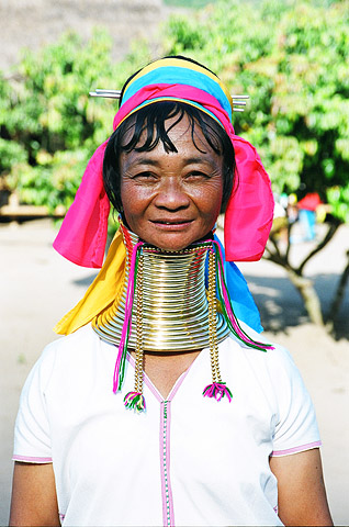This woman, a Karen refugee from Burma, sports a long, brass coil around her neck common among many of the hill-tribe villages in northern Thailand.