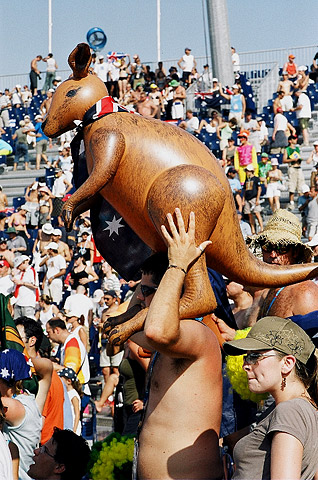 An Australian spectator - with prop - at the beach volleyball. 