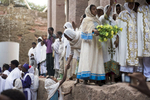 A wedding party winds its way through the rock-hewn Churches of Lalibela in Lalibela, Ethiopia. There are 11 churches, each carved from solid rock in the 12th and 13th centuries as an Ethiopian version of Jerusalem.