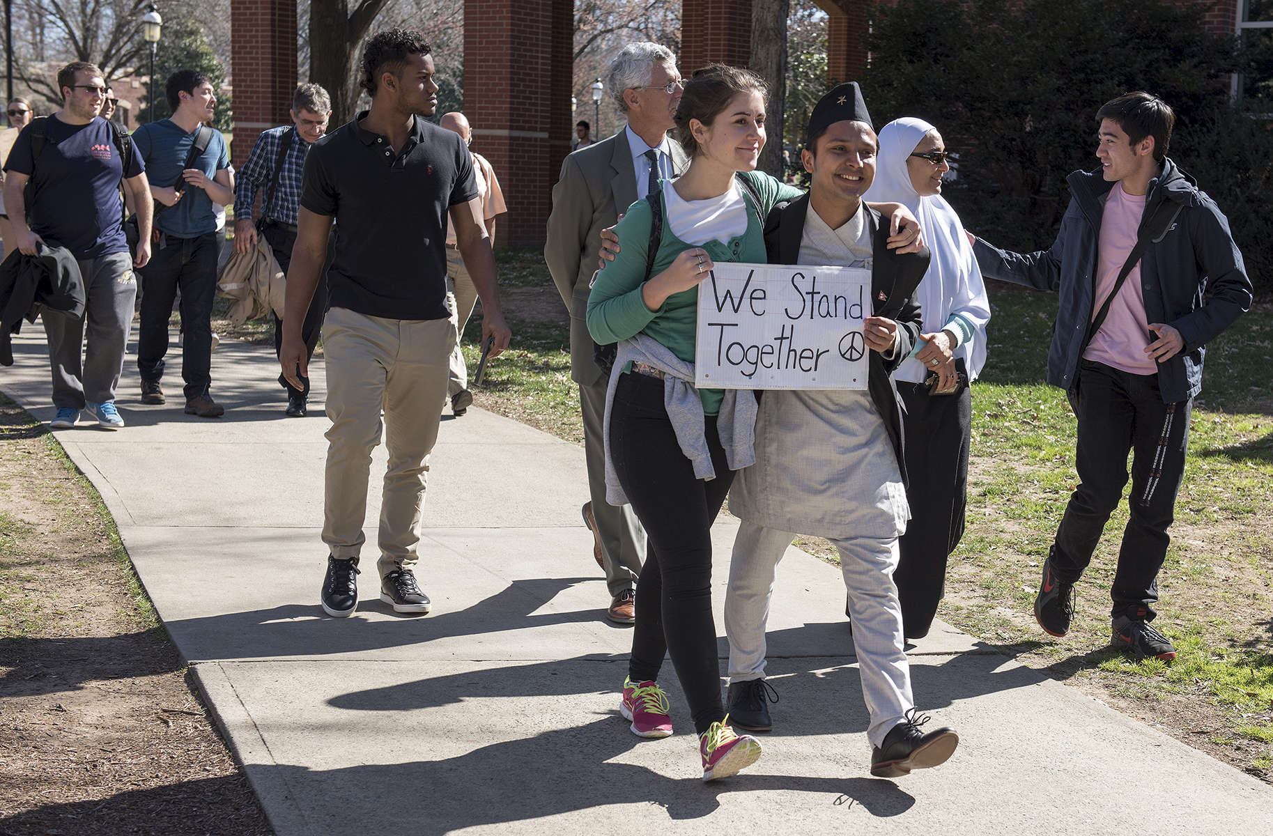 More than 100 students, faculty and staff gathered at Elon’s Speakers' Corner on Young Commons to share their concerns and hold a march addressing the president’s recent Executive Order regarding immigration.