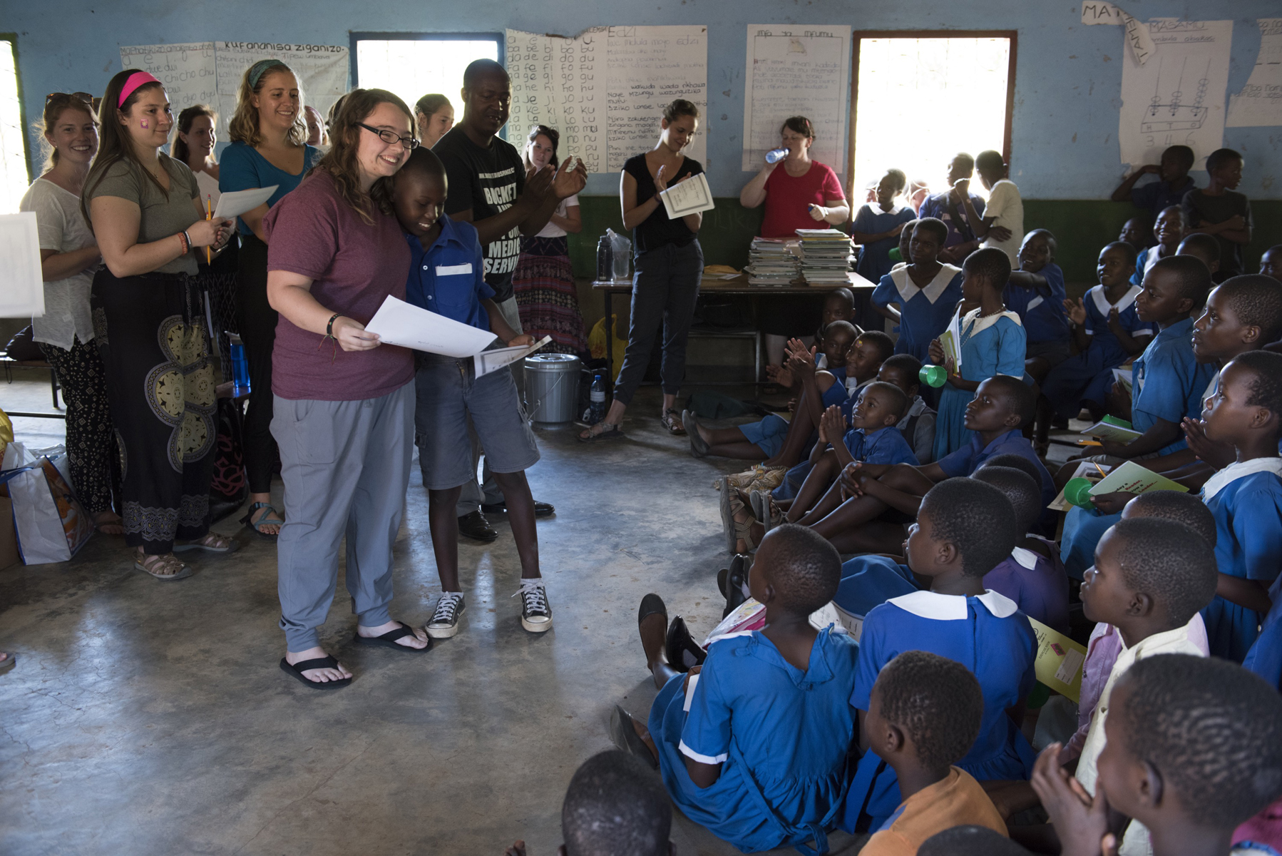 On their last day at the school, the Elon students present awards to each Malawian child.