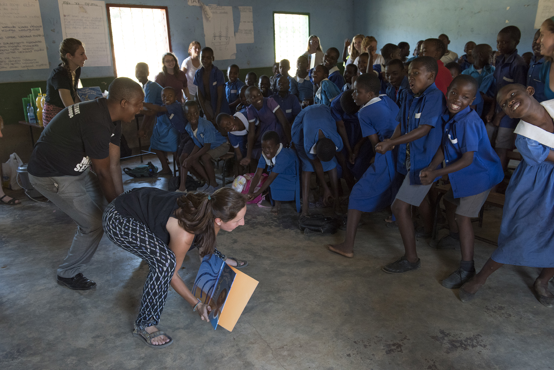 Elon students work with school children in Baluti, a village in the outskirts of Blantyre, Malawi. The students spent a week at, Namasimba, a rural school, tutoring students in reading comprehension.