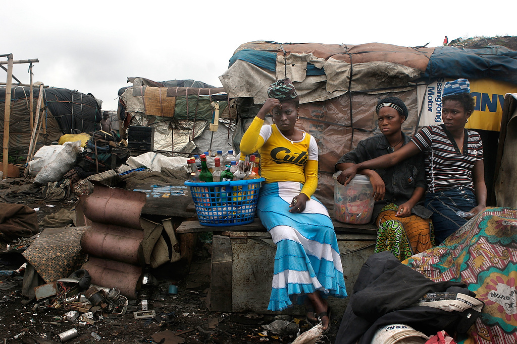 Selling Liquor in a shanty town in Lagos, Nigeria