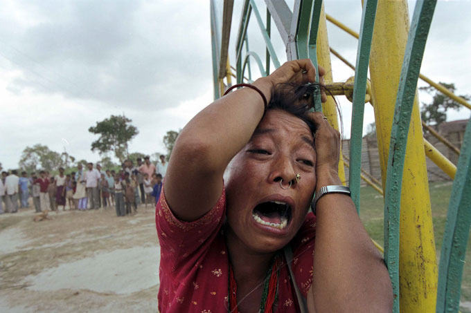 A Nepali mother cries in agony when she discovers her daughter is not at the circus. She had travelled several days from Nepal to find her. Locals from the village looked on but have no sympathy for Nepalis, who they consider primitive due to their relative poverty.