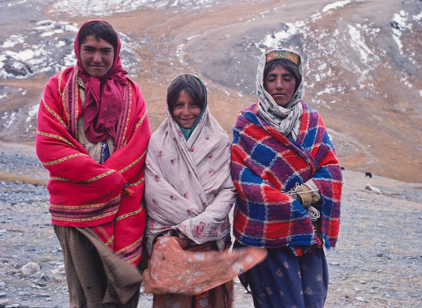 Three Shimshali shepherd girls out with their flocks