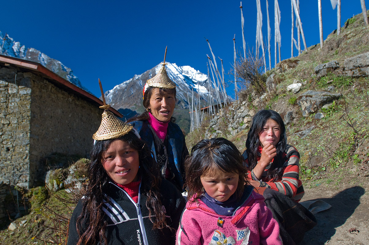 Women at Laya, Bhutan. Wearing the distinctive bamboo hats of the regionNikon D300, 17-35mm
