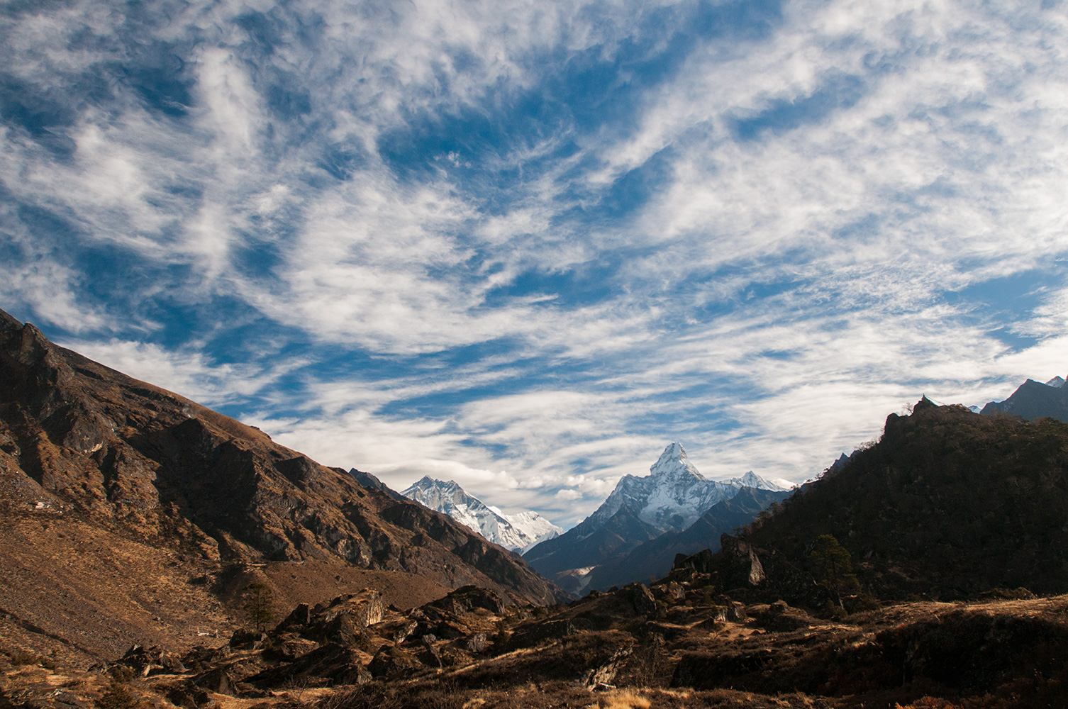 A view up valley from near Khumjung, under a winter sky.Nikon D300, 17-35mm. December 2008