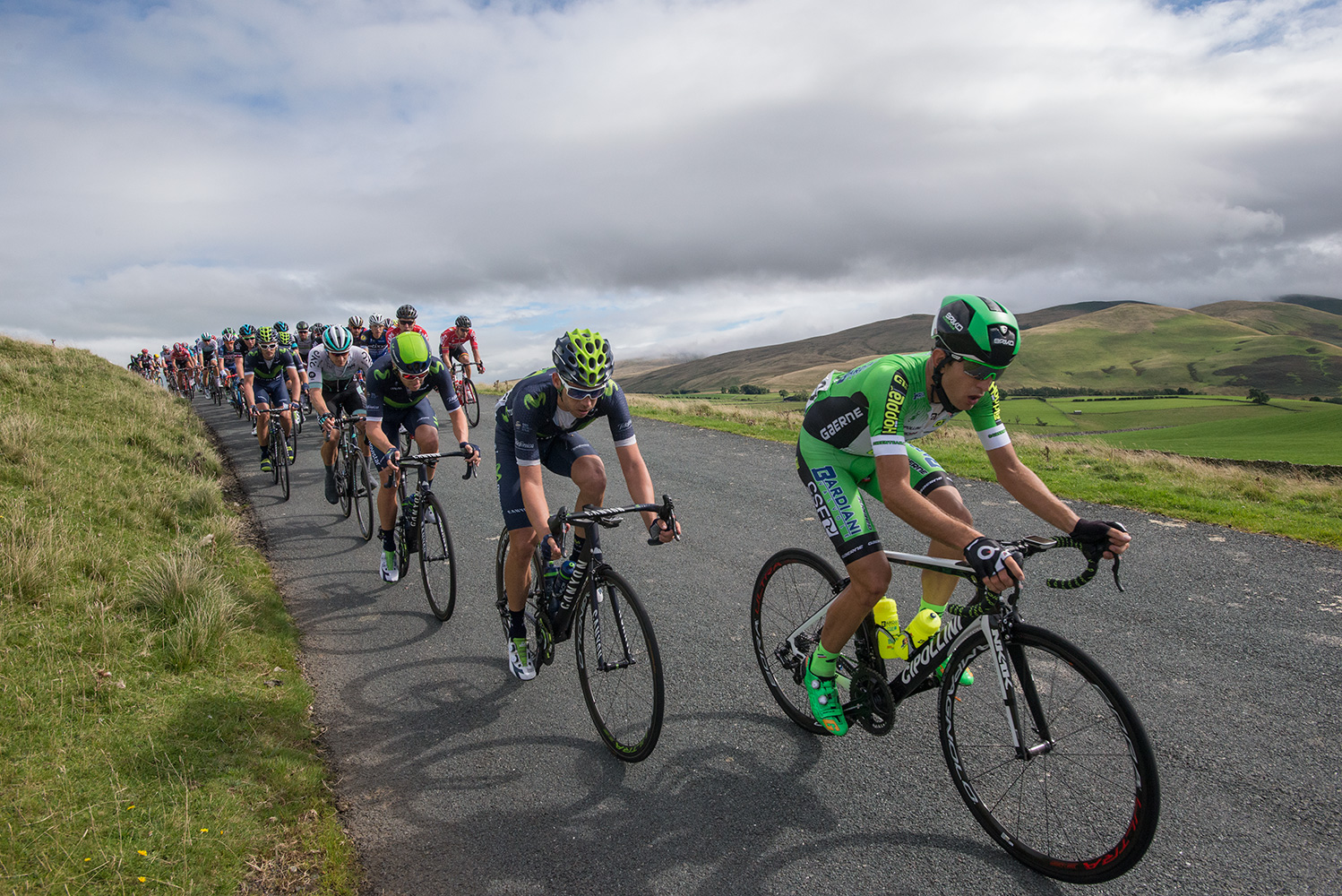 Bardiani GreenTeam leads the peleton over Caldbeck Commons in Cumbria on Stege 2