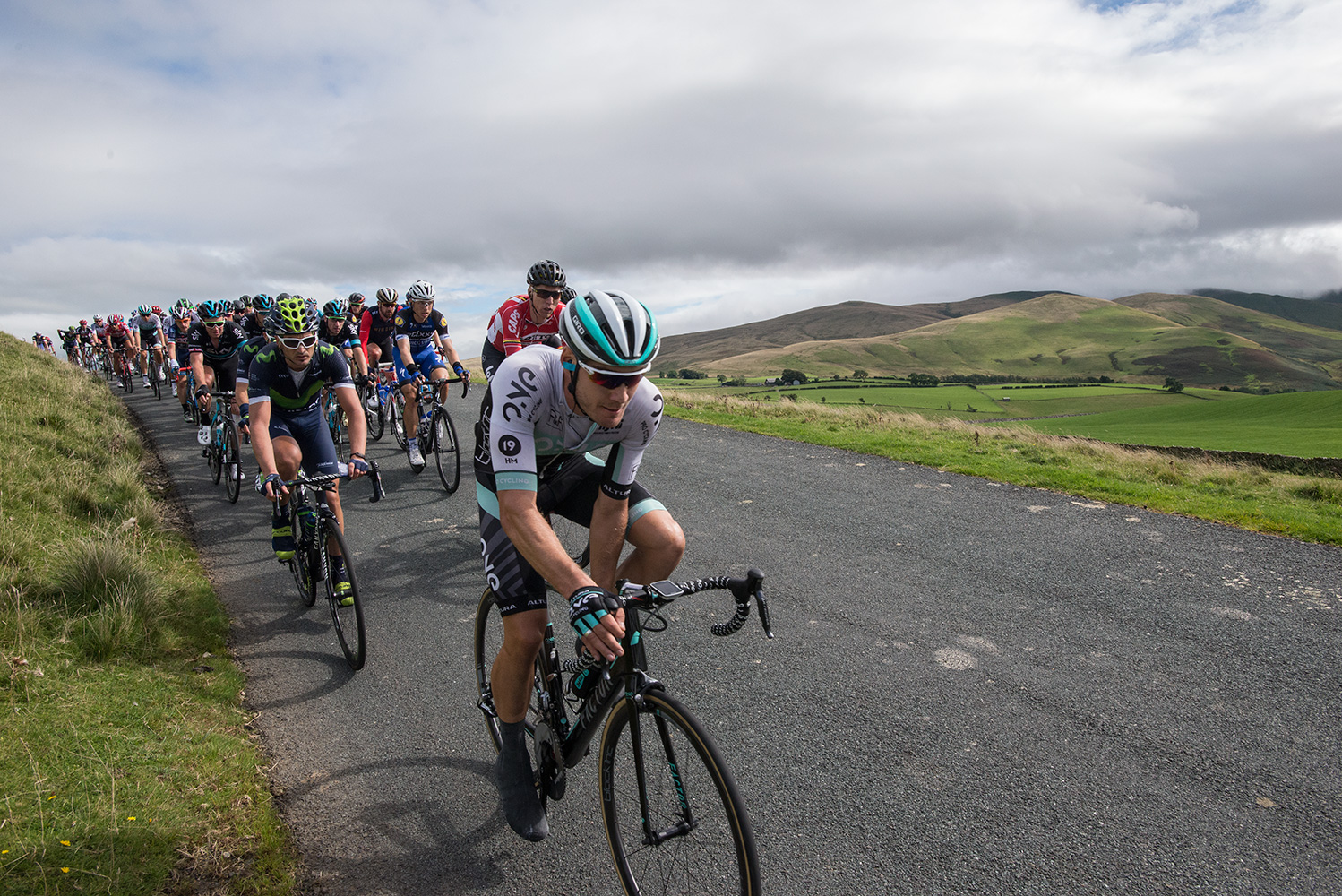 The peleton at the top of the descent into Uldale from Caldbeck Commons