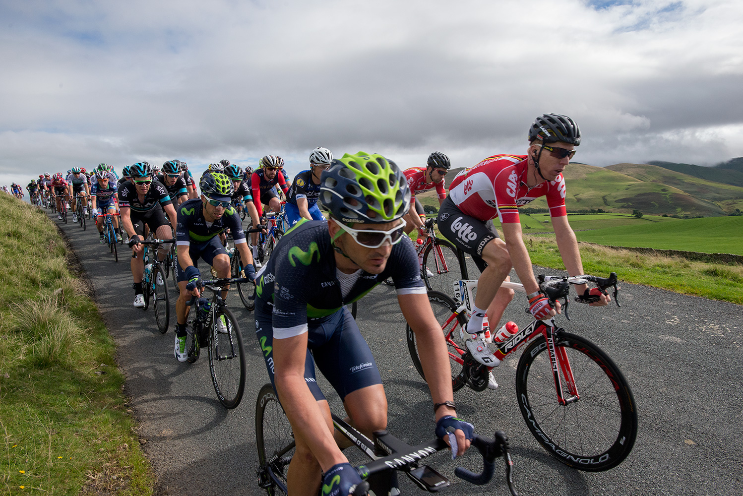 Bradley Wiggins tucked into the peleton on Caldbeck Commons, Cumbria, during Stage 2