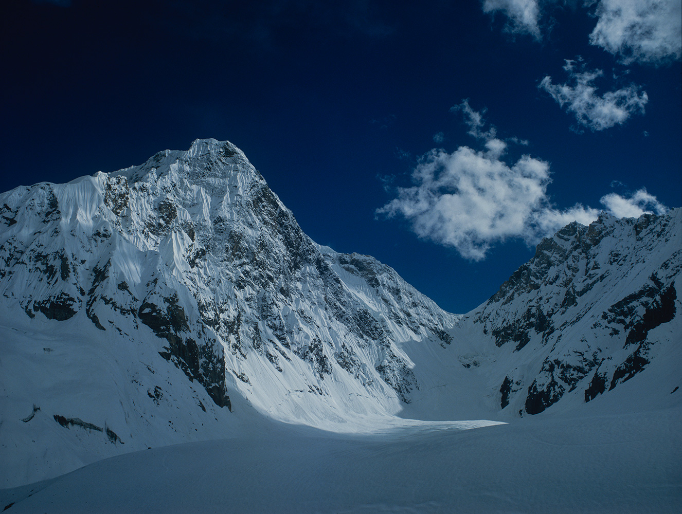 Mark Miller, Anwar Ali & I spent a month exploring some of the less visited corners of the glaciated valleys above Hushe in 1989, and we named this peak Gnasherbrum...