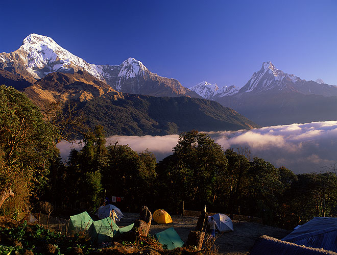 A view north from Tarapani, with Annapurna South (7219m) and Hiunchuli (6441m) on the left, and Machhapuchhare aka Fish Tail (6993) beyond the deep cleft of the valley on the right.Nikon FM2, 24mm, Fuji Velvia