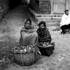 Wrapped up against the late autumn chill, these girls are selling their vegetable produce at the daily dawn streetmarketBronica ETRS, 50mm, Ilford HP5 @ 800ASA
