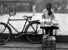 A young boy selling breadBronica ETRS, 75mm, Ilford HP5 @ 800ASA