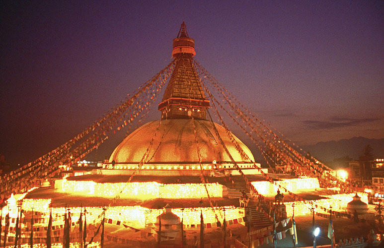 The great stupa at Bodnath, lit up with thousands of butter lamps at dusk during the festival of Mani RimduNikon FM2, 24mm, Fuji Velvia