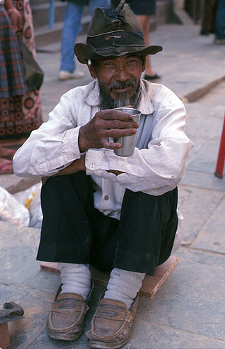 A Tibetan shopfitter taking a breakNikon FM2, 50mm, Fuji Velvia