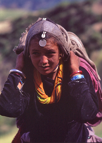 A Khasa Chhetri girl carrying her family's picnic hamper up to Raling for the festival.Bronica ETRS, 75mm, Fuji Velvia