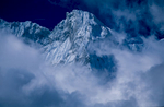 Part of the summit ridge, seen through breaking cloud from just below the Langma LaNikon F5, 180mm, Fuji Velvia 100