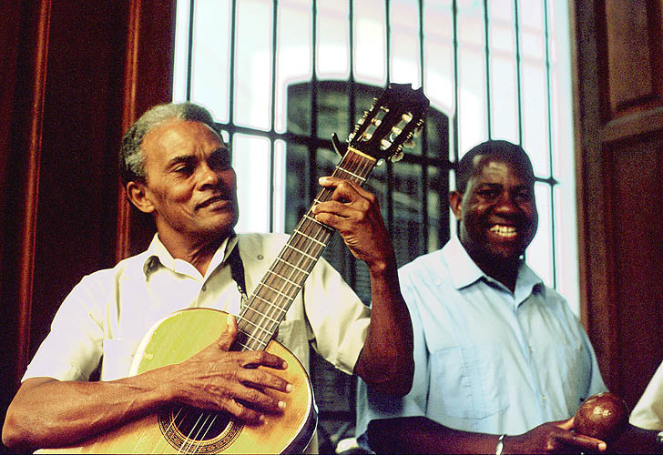 Walk the streets of La Habana Vieja as evening approaches, and the sound of live music can be heard drifting into the streets from almost every bar. Of course the Buena Vista Social Club deserve every accolade they recieve, but the breadth of Cuba's musical heritage is so much greater....Nikon FM2, 24mm, Fuji Velvia