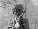 A dhami or shaman smoking his chillum - called a sulpa in Humla - at a village below Simikot in the Humla Karnali valley, far-western NepalBronica ETRSi, 70mm, Ilford HP5 @ 800ASA