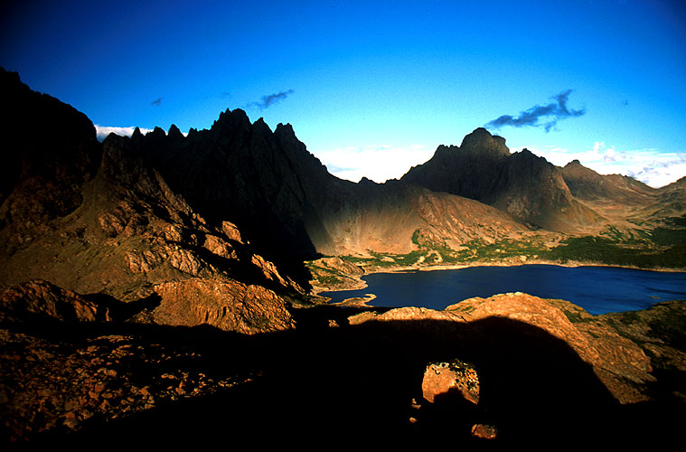 An evening view east along the southern side of the Dientes de Navarino from above Lago Escondida. Nikon FM2, 24mm, Fuji Velvia 