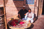 Flower sellers at the mausoleum of Sufi saint Shah Rukn-i-'AlamBronica ETRS, 75mm, Fuji Velvia