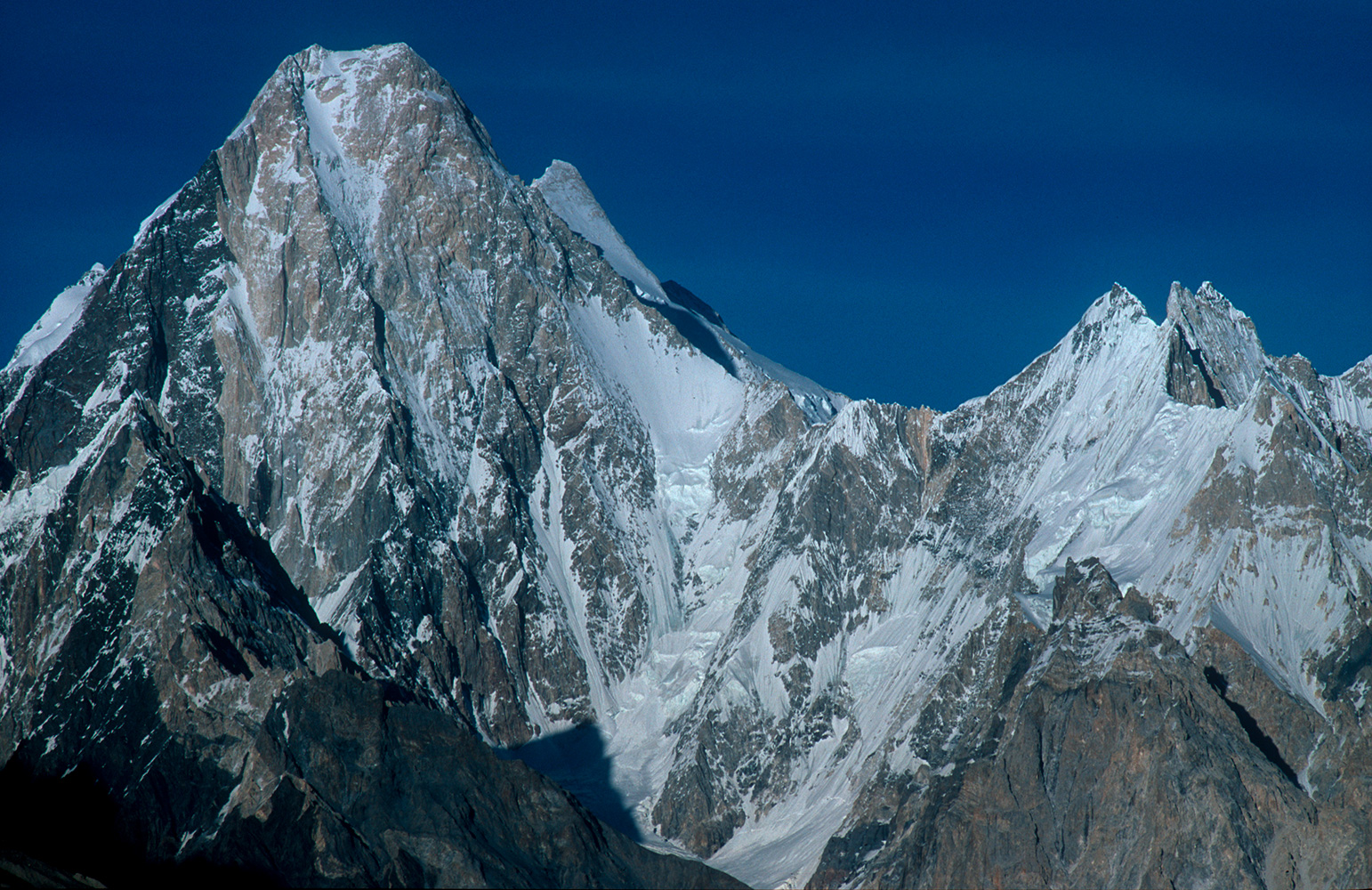 Telephoto of the west face from Goro. Gasherbrum II (8035m) is just visible over the right shoulder.Nikon F5, 180mm
