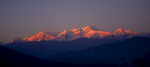 The Ghurkha Himal at sunset, from just above the town of Ghorka. On the left is Ngadi Chuli (7935m), in the centre Himal Chuli (7893m) with its long south-east ridge shaply illuminated. On the right is Bhauda Himal (6672m).Nikon FM2, 24mm, Fuji Velvia