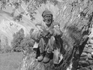 Portrait of a Balti man from Askole (Askole-Pa) sitting in a willow tree watching his sheepBronica ETRSi, 70mm, Kodak T-Max