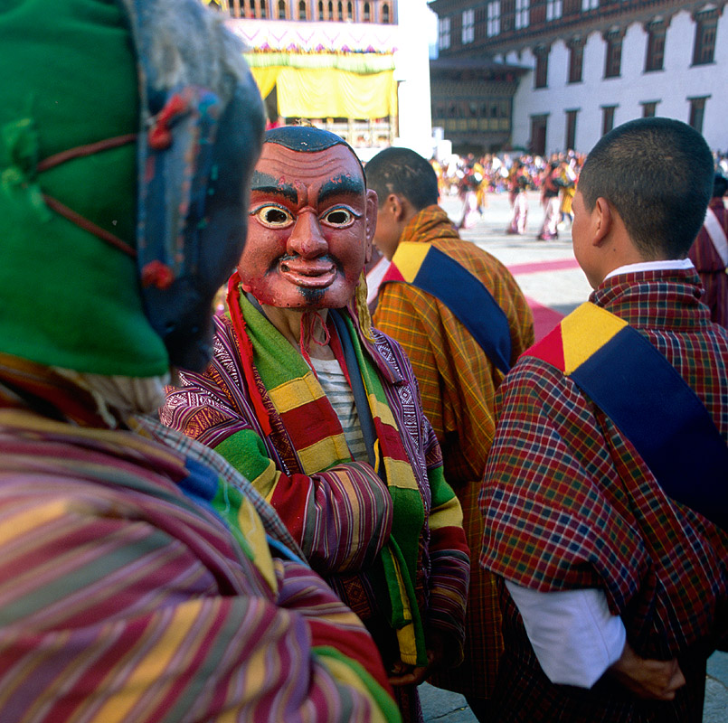Clowns prepare to entertain he crowds at the annual tsechuNikon FM2, 24mm, Fuji Velvia