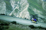 Ken and Cindy Dowling cranking it out on their tandem on the descent from the Kamba La to Yamdrok Yam Tso (lake) on the old road from Lhasa to GyantseNikon FM2, 105mm, Fuji Velvia