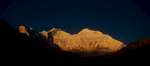 The first rays of sun illuminate the east faces of Lhotse and EverestNikon F5, 17-35mm zoom, Fuji Velvia 100