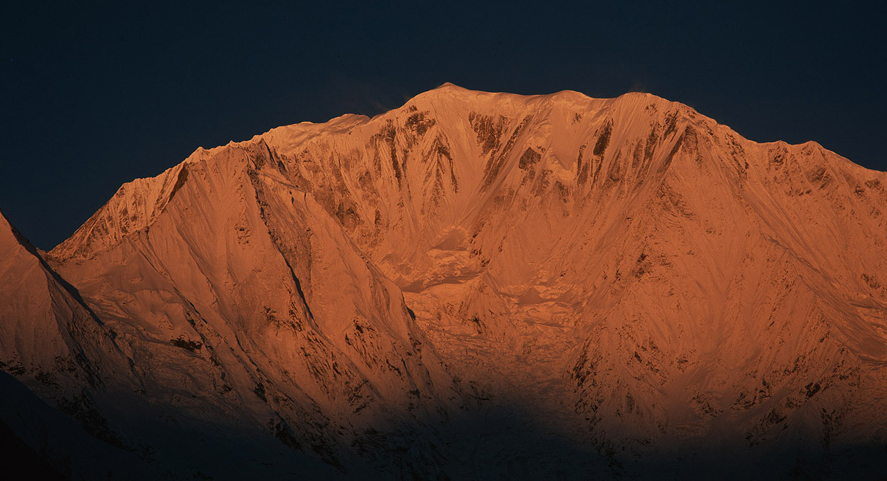 A telephoto at sunrise from Rani Karka in the Khuwari Kola valley. This was on of those Himalayan Sartori moments! After being tent-bound in a storm for three nights, I awoke at dawn to a crystal clear sky and the first rays of sun just kissing the summit of Saipal above. A sprint in my underwear and a down jacket had the tripod up and this picture taken. Just awesome.Project VeronicaMedium format images re-scanned in a professional glass film- holder with my Nikon Coolscan 9000 and Silverfast 8 software. These images display larger on the site - enjoy!Bronica ETRSi, 150mm, Fuji RDP II