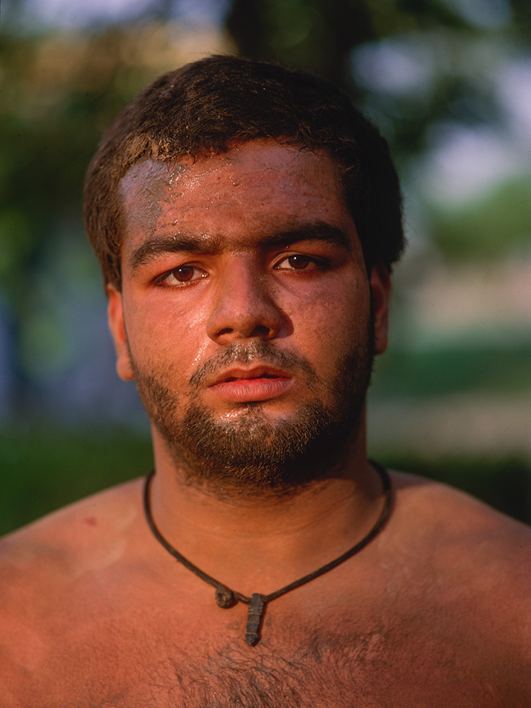 Wrestler at a training centre in the Hazuri Bagh, Lahore. Wrestling, or koshti, has been practiced in Pakistan since ancient times, and here in the Punjab it is known as Pehlwani.Bronica ETRS, 50mm, Fuji Velvia
