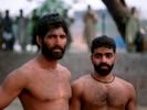 Wrestlers  training in the Hazuri Bagh, Lahore. Wrestling, or koshti, has been practiced in Pakistan since ancient times, and here in the Punjab it is known as Pehlwani.Bronica ETRS, 50mm, Fuji Velvia