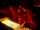 Monks lighting butter lamps during the festival of LhosarNikon F5, 17-35mm, Fuji Provia 400