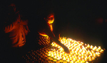 Buddhists lighting butter lamps during LhosarNikon F5, 17-35mm, Fuji Provia 400