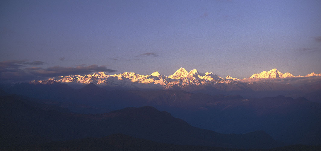 A panorama at dawn from the Shivapuri Lekh to the north of KathmanduNikon FM2, 24mm, Fuji Velvia