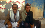 Two Bedouin men at a roadside qat-stopNikon F5, 17-35mm, Fuji Velvia 100