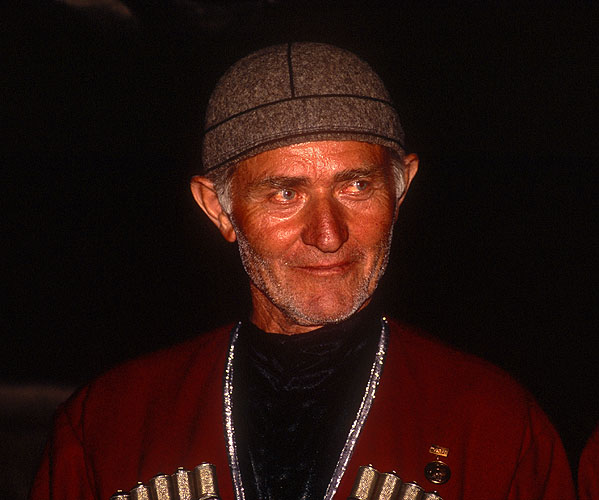 A member of the village's traditional polyphonic male-voice choir, in full Georgian national costume.Nikon F5, 17-35mm, Fuji Velvia 100