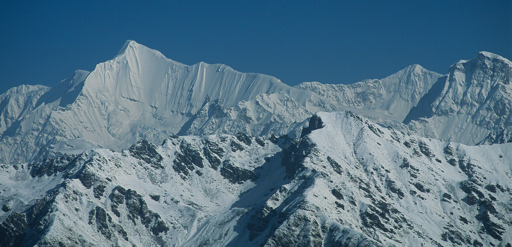 A telephoto of this stunning peak east of the Trisul group,from high on the Kagundi Bhel Khal ridgeNikon F90X, 180mm, Fuji Velvia