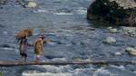 Women crossing the Lidder riverCanon A1, 135mm, Kodachrome