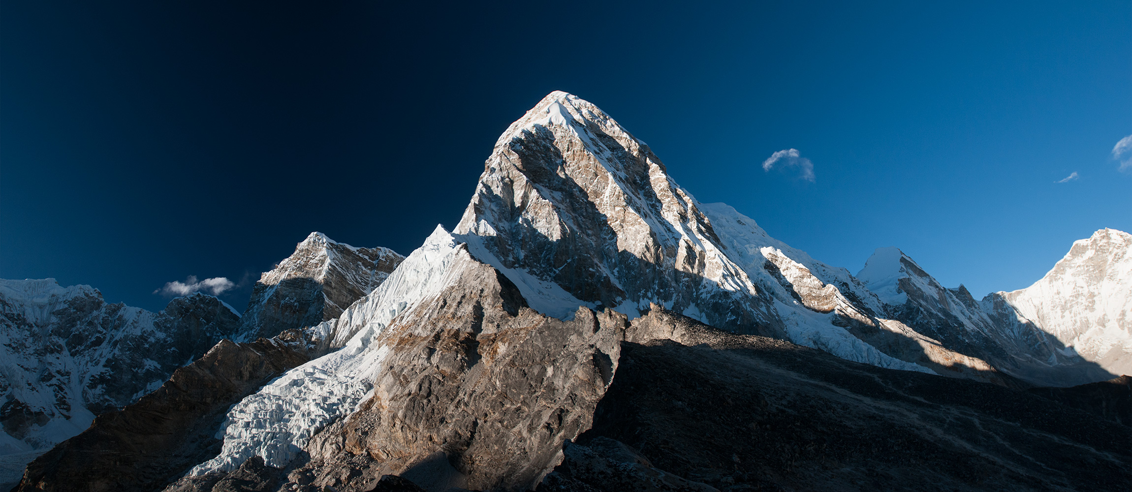 From the moraine of the Khumbu glacier at Gorak Shep. First climbed in1962 by Gerhard Lenser on a German-Swiss expedition, this mountain has become popular with expeditions, in spite of the fact that avalanches have killed so any on its slopes. A stitch of two imagesNikon D300, 17-35mm
