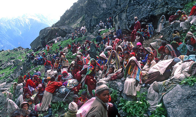 This festival takes place over several days at the remote Raling Gompah, and the folk from villages in the valleys below make their way there in a huge procession. Here a group of Chhetris from lower Humla rest during the long final climb to the monastery.Bronica ETRS, 50mm, Fuji Velvia