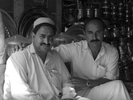 Shopkeepers in Saidu Sharif. Two men sitting in their kitchen-ware shop in the capital of Swat, NWFP, Pakistan
