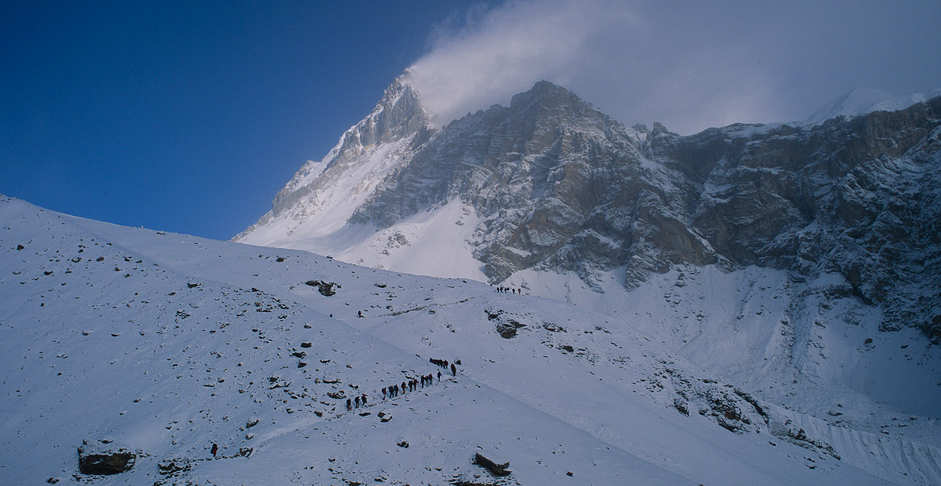 Trekkers approaching the pass in DecemberProject VeronicaMedium format images re-scanned in a professional glass film- holder with my Nikon Coolscan 9000 and Silverfast 8 software. These images display larger on the site - enjoy!Bronica ETRSi, 150mm, Fuji Velvia