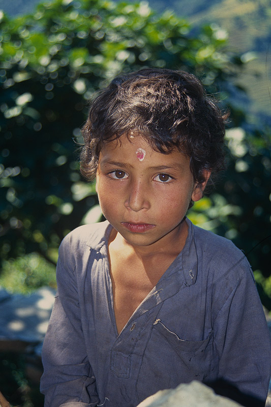 A boy at this remote settlement on the southern approach to KangchendzongaNikon FM2, 50mm, Fuji Velvia